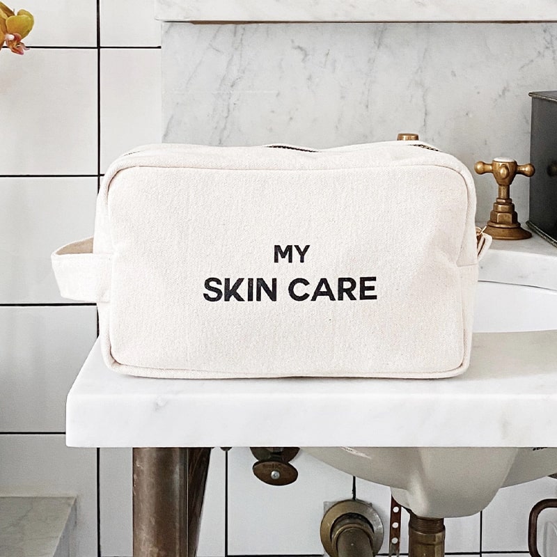 Bag-All My Skin Care Organizing Pouch - Cream - product shown on sink