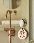 Carriere Freres Rose Mint Botanical Palet - product shown hanging from door knob in bathroom