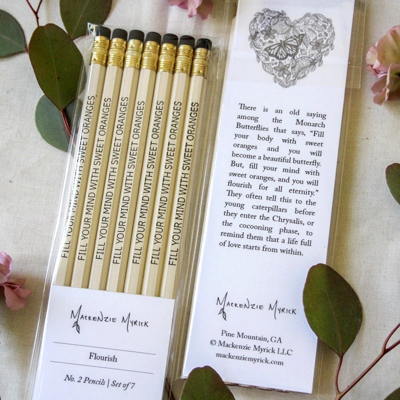 Mackenzie Myrick Studio Flourish Pencil Set - products shown in packaging with leaves