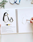 Emily Lex Studio Winter Watercolor Workbook - model shown painting inside product