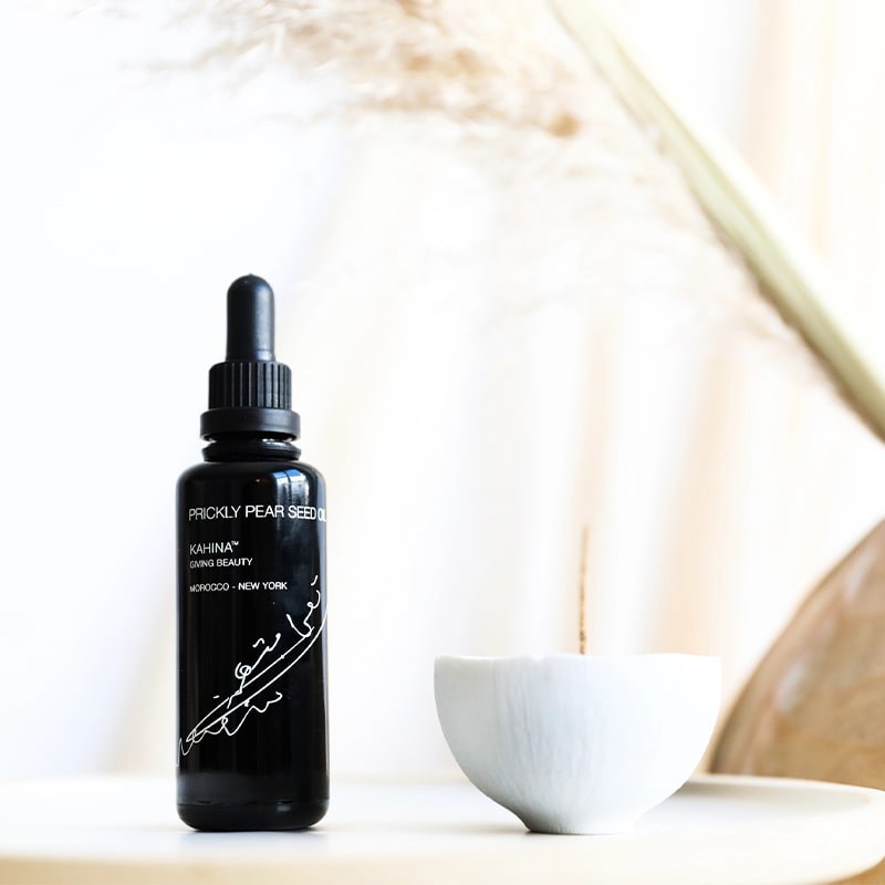 Kahina Giving Beauty Prickly Pear Seed Oil - product shown next to ceramic bowl