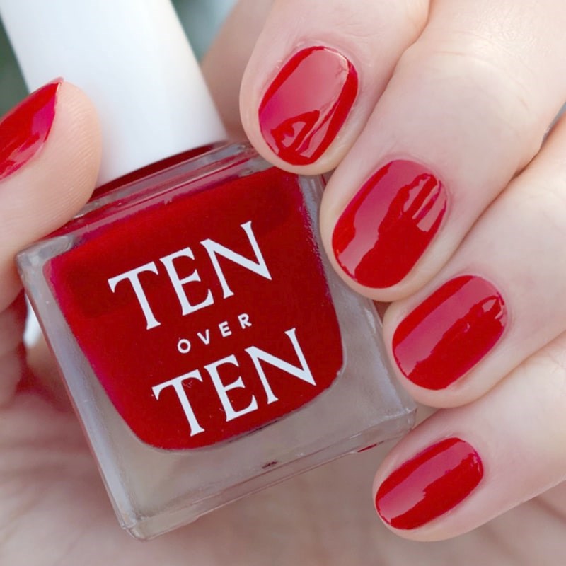 Tenoverten Nail Polish - Cherry - model shown holding product