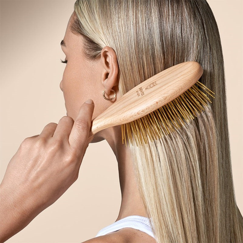 Snow Fox Skincare Gua Sha Hair & Scalp Brush: Premium Wooden Edition - model shown using product in hair