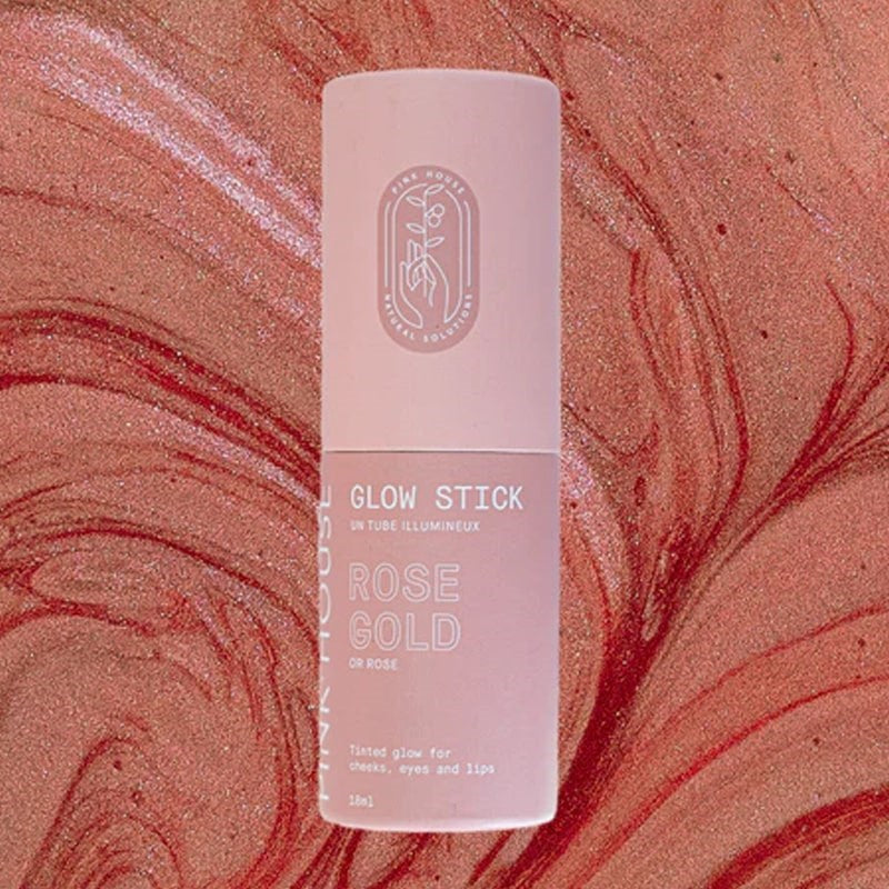 Pink House OrganicsGlow Stick - Rose Gold - product shown on textured background