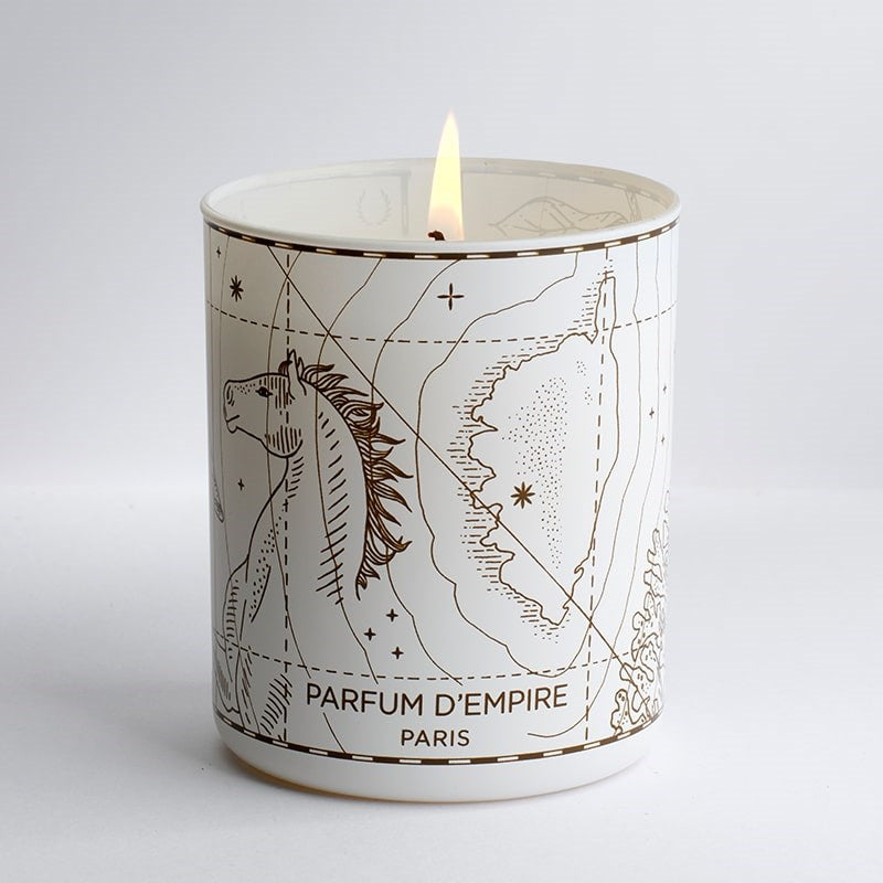 Parfum d&#39;Empire Mauvaises Herbes Scented Candle - product shown lit