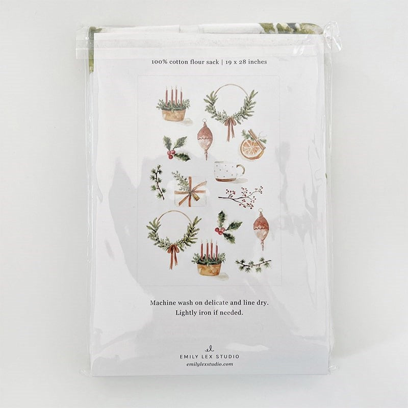 Emily Lex Studio Yuletide Tea Towel - backside of product shown inside packaging