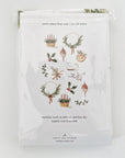 Emily Lex Studio Yuletide Tea Towel - backside of product shown inside packaging