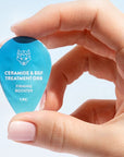 Snow Fox Skincare Ceramide & EGF Treatment Orb - model shown holding product