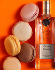 Parfums de Nicolai Macaron Bourbon Intense Eau de Parfum - product shown next to macarons