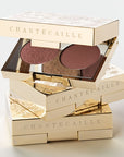 Chantecaille Gilded Garden Eye Duet - Cassis - multiple products stacked on top of each other