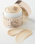 Chantecaille Sheer Glow Gold Face Tint - product shown with cap off next to product smear