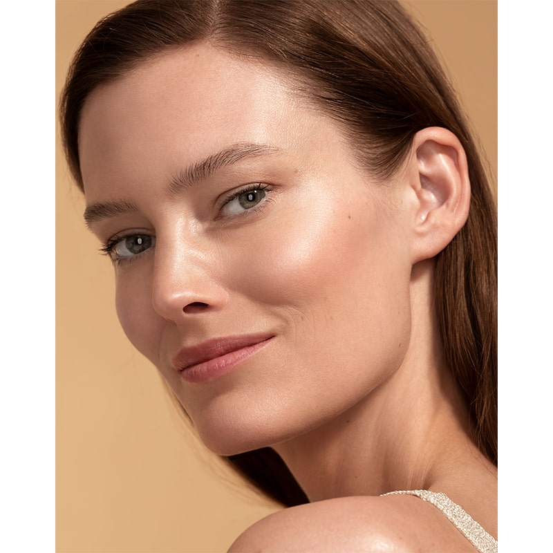 Chantecaille Sheer Glow Gold Face Tint - model shown wearing product