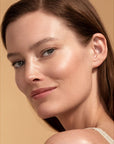 Chantecaille Sheer Glow Gold Face Tint - model shown wearing product