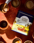 Herbs & Kettles Masala Chai - product shown next to cups of tea