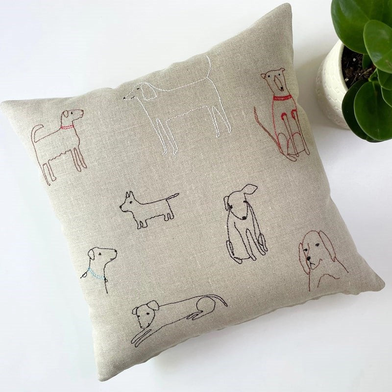 Lifestyle shot of K Studio Dogs Linen Pillow (1 pc)