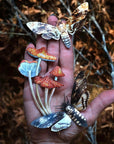 Moth & Myth Forage Moth & Mushroom Set (3 pcs) shown in palm of model's hand