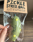 People I've Loved Pickle Stress Ball - model holding product inside packaging shown