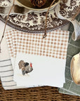 Emily Lex Studio Turkey Place Cards - products shown next to spoons, plate, and napkins