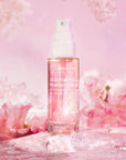 Snow Fox Skincare Celestial Flora Priming Serum - product shown surrounded by flowers