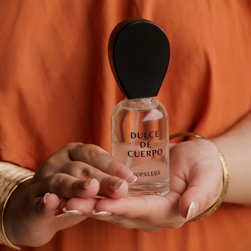 Nopalera Dulce de Cuerpo Eau de Parfum - model shown holding product