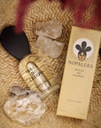 Nopalera Dulce de Cuerpo Eau de Parfum - product shown next to packaging and stones