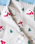 Tiepology Santa Claus Village Casual Socks - Beige & Blue - close up of product pattern 