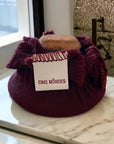 Cinq Mondes Moroccan Clay Pumice Stone Foot Exfoliant - product shown in cloth bag