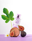 Solinotes Paris Fig Tree Eau de Parfum - product shown on top of fragrance ingredients