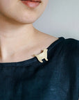 Fog Linen Work Cat Brass Brooch Oscar - model wearing product on shirt shown