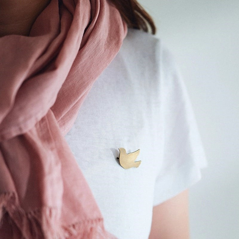 Fog Linen Work Bird Brass Brooch Cuckoo - model shown wearing product on shirt