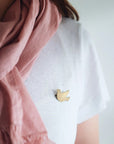 Fog Linen Work Bird Brass Brooch Cuckoo - model shown wearing product on shirt