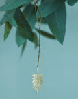 Fog Linen Work Brass Leaf - H - product shown hanging from plant