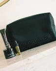 Le Prunier The Signature Mini Set - products shown next to toiletry bag