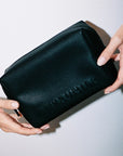 Le Prunier The Signature Mini Set - model shown holding toiletry bag