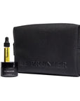 Le Prunier The Signature Mini Set (3 pcs) - products shown next to toiletry bag