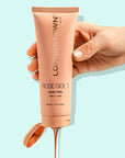 Londontown Rose Gold Hand Peel - model shown squeezing product bottle