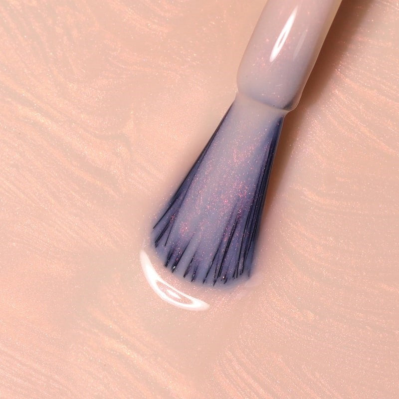 Londontown Illuminating Nail Concealer - Bubble - product brush shown in product liquid