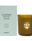 Flamingo Estate Organics Douglas Fir & Ancient Vetiver Candle - product shown next to packaging