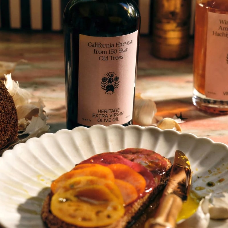 Flamingo Estate Organics Heritage Extra Virgin Olive Oil - product shown on top of food