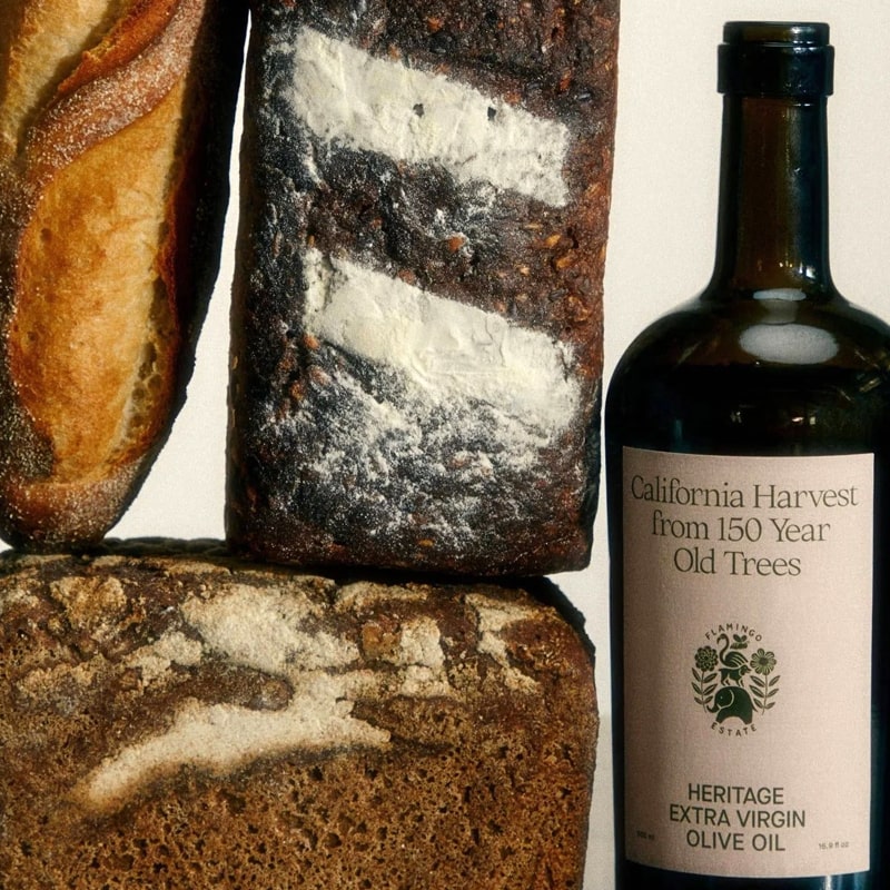 Flamingo Estate Organics Heritage Extra Virgin Olive Oil - product shown next to bread