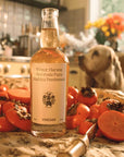 Flamingo Estate Organics Winter Harvest Persimmon Vinegar - product shown next to persimmons 