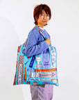 Yellow Owl Workshop Bookbag Art Sack - model shown holding product