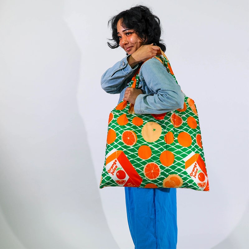 Yellow Owl Workshop Oranges Art Sack - model shown holding product