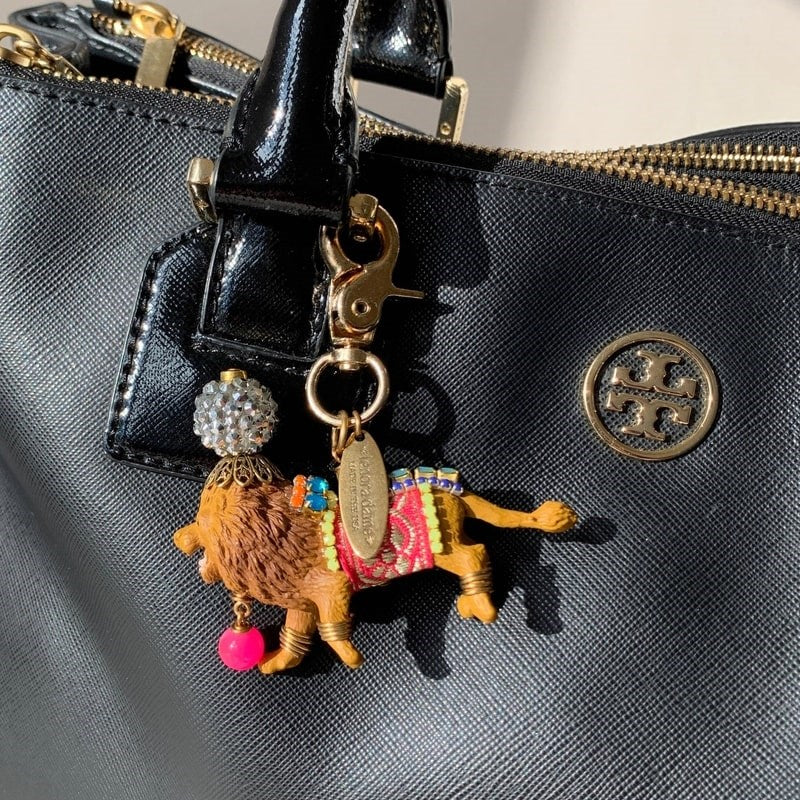 Lenora Dame Party Lion Bag Charm - product shown hanging from purse