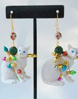 Lenora Dame Tangled in Lights Cat Holiday Earrings - products shown on earring stand