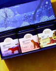 Lifestyle shot top view of Herbs & Kettles Chai Gift Set (3 pcs) showing 3 included Chai tins