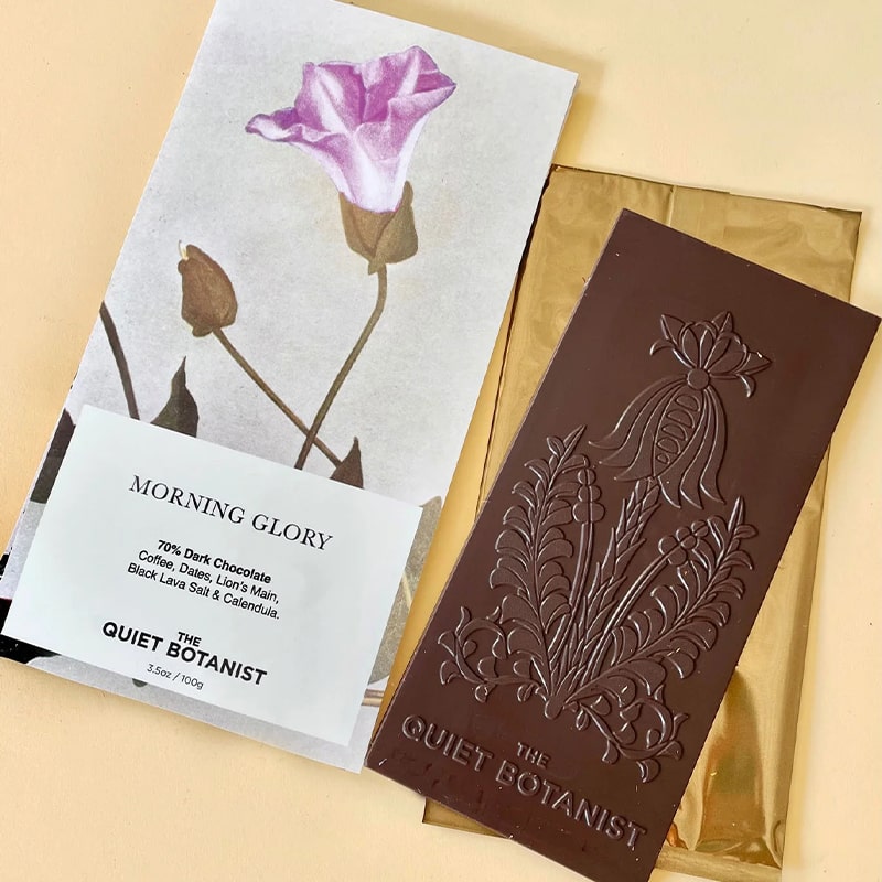 The Quiet Botanist The Morning Glory Chocolate Bar - product shown next to packaging