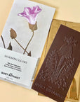 The Quiet Botanist The Morning Glory Chocolate Bar - product shown next to packaging