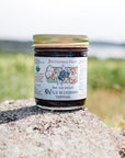 Smithereen Farm Organic Wild Blueberry Topping - product shown on rock in nature