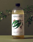 Koala Eco Natural Laundry Wash - Lemon Scented Eucalyptus and Rosemary - product shown in front of branch